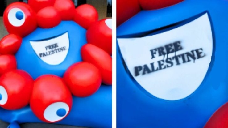 口の部分に「FREE PALESTINE（パレスチナに自由を）」と落書き