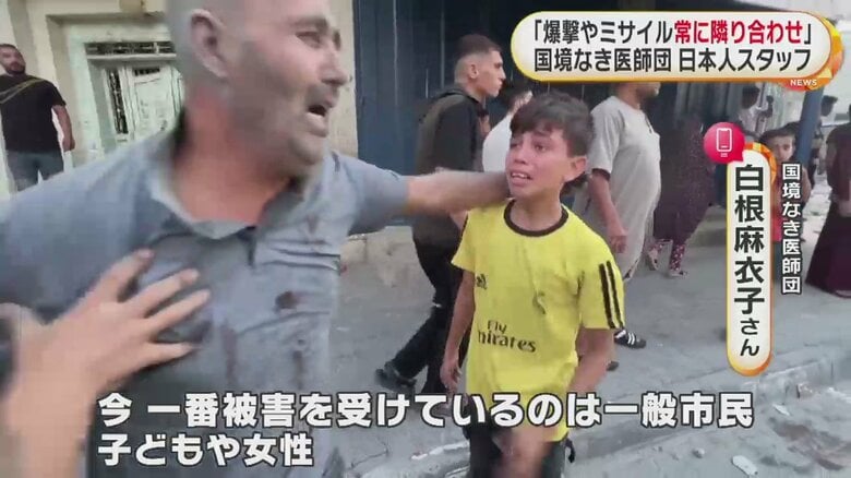 抱き合う男性と子ども