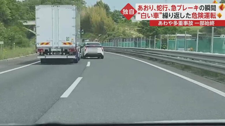 急ハンドルを切って、トラックの前に