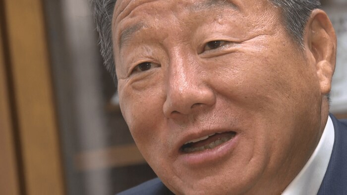 スポーツを通じた南北交流の展望を語る崔団長。