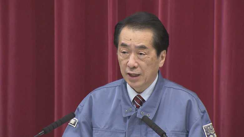 会見する菅直人首相（当時）