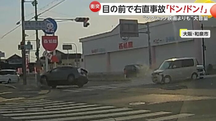 歩道の柵に衝突した黒い車(視聴者提供)