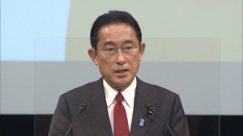 防衛・経済安全保障シンポジウムで挨拶する岸田首相（2021年12月3日）