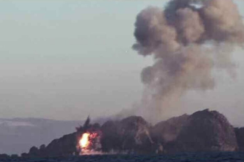 「超大型放射砲」試験発射の記事(労働新聞・1月1日付け)に添付された弾着と見られる画像(1)。