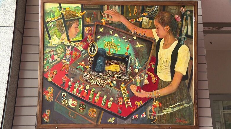 玄海町の町民会館に飾られている藤井さんのミシンの絵