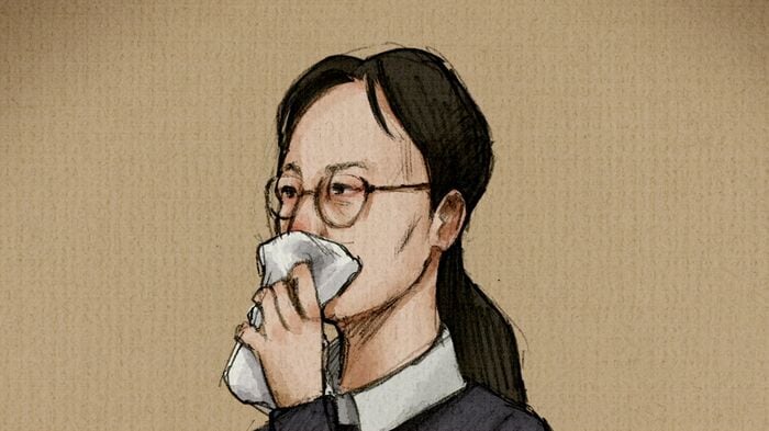 浩子被告は時折口元をおさえていた