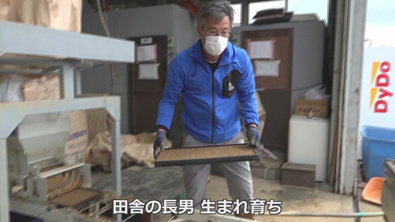 コメの種まきをする中垣内祐一さん