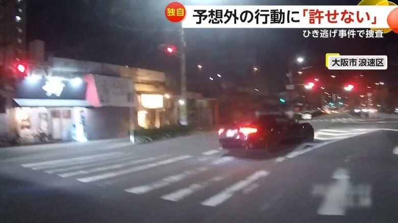 バイクに追突した黒い車が信号を無視して逃走する瞬間（1月22日午後9時ごろ、大阪市浪速区）（3）