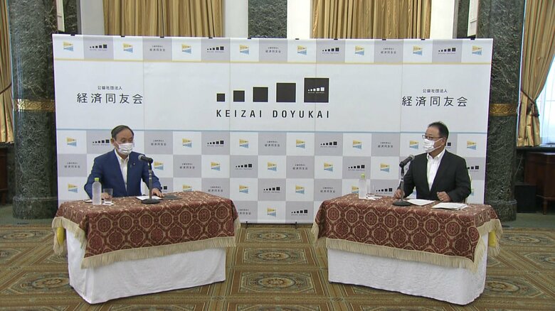 桜田代表幹事と会談する菅首相