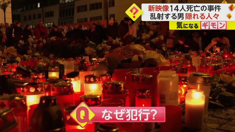 たくさんのロウソクや花が手向けられている