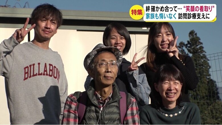 子どもたちと一緒の家族写真