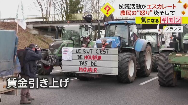 賃金引き上げやコスト削減を求める抗議