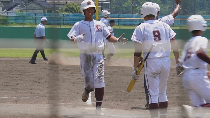 生還する飛田投手
