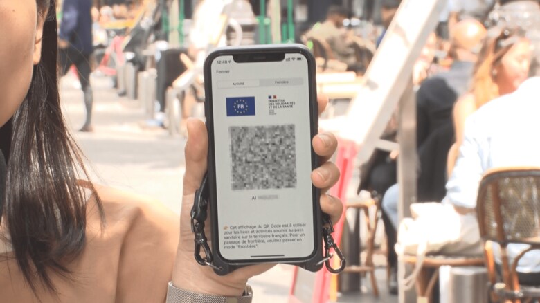 政府提供のアプリでワクチン接種歴を提示する