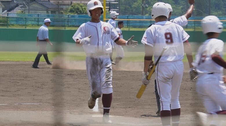生還する飛田投手