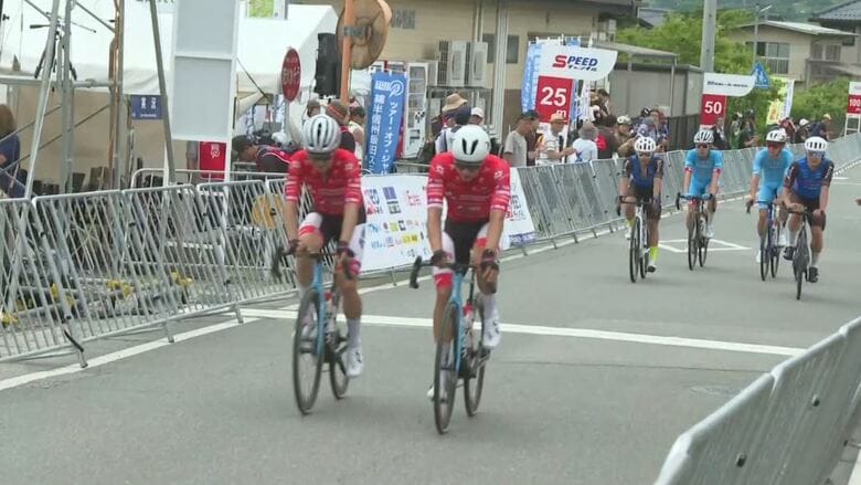 国内最大規模の自転車レース「ツアー・オブ・ジャパン」　“焼き肉の街”飯田市ではバーベキューをしながら応援する姿も｜FNNプライムオンライン