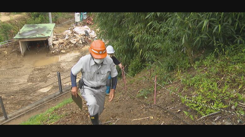 住民に声をかけ高台へ避難