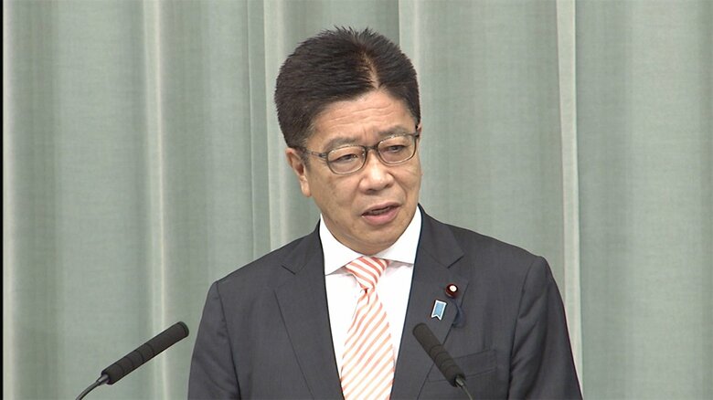 「悪意あるサイバー攻撃は看過できない。日本政府としては断固非難する」と述べる加藤官房長官