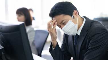 感染し会社で同僚らから非難の的に…インフルエンザによる“ハラスメント”