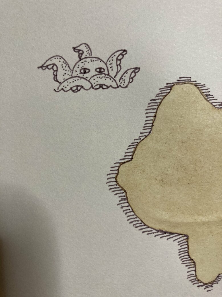 メジェドさま風の目を入れて、点描で装飾して完成。可愛い。