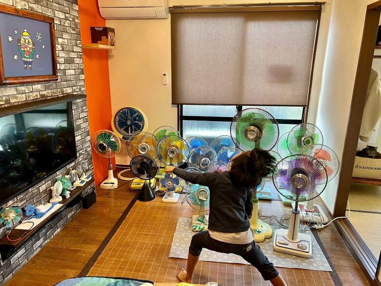 風を感じる息子さん