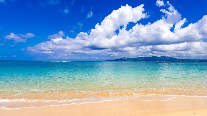 国内旅行にも魅力はいっぱい 画像は沖縄の海