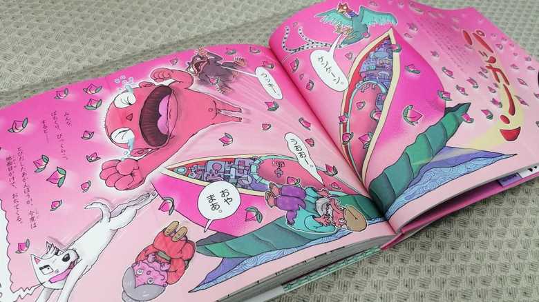 「百桃太郎」のワンシーン。迫力のパノラマページも登場する(文/原 京子 絵/原 ゆたか ポプラ社)