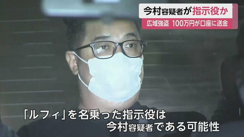警察車両に乗った今村磨人容疑者（39）。落ち着いた様子だった