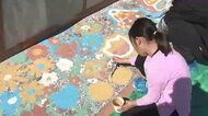 北九州市で『サステナまちなかペインティング』　熱を遮る効果のある塗料で路面に「花」描く　市民70人が参加　「街の彩りと快適性を高め魅力アップに」　福岡