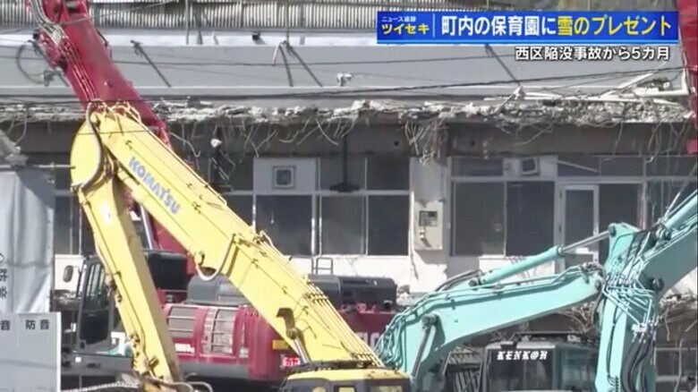 被害を受けた４階建ての建物の解体作業