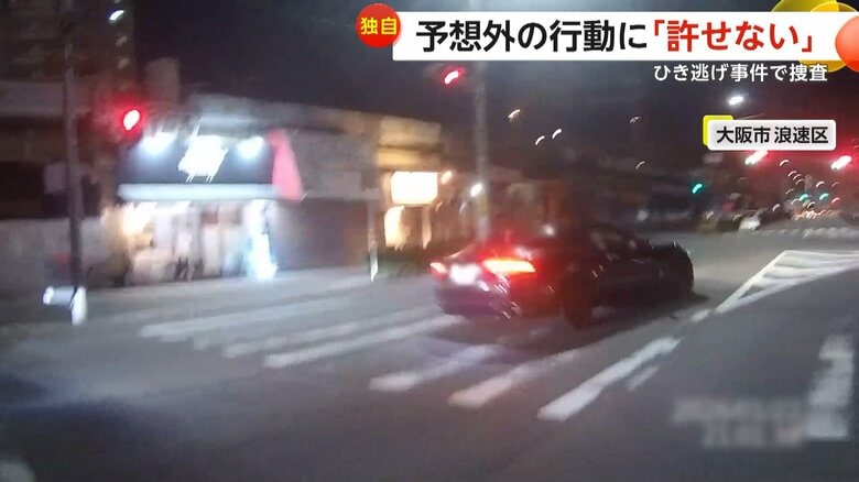 バイクに追突した黒い車が信号を無視して逃走する瞬間（1月22日午後9時ごろ、大阪市浪速区）（2）