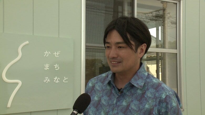「男鹿の中心部を多くの人が行き交うようにしたい」と語る男鹿まち企画の岡住修兵さん（37）