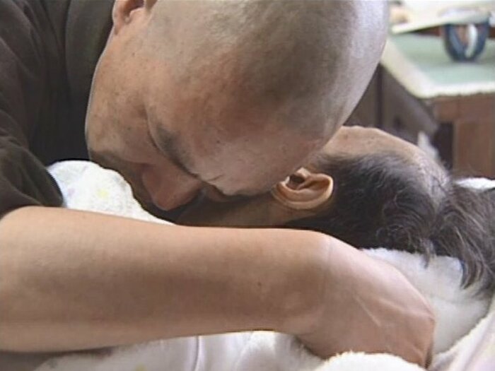 お別れの言葉をかける金子さん
