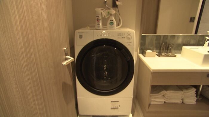 部屋の中に洗濯機も完備