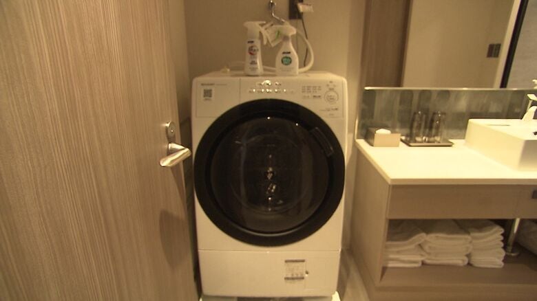 部屋の中に洗濯機も完備