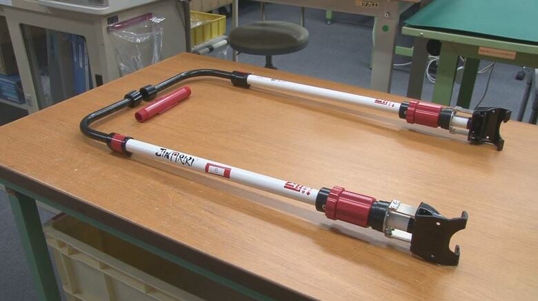 車いす牽引用補助装置の「JINRIKI」