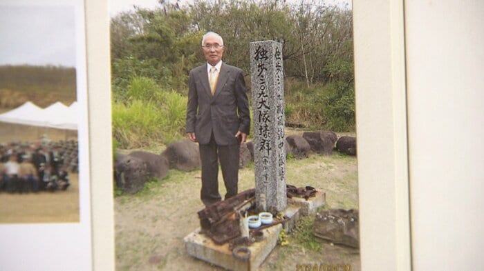 父親が所属していた第三○九大隊の地下壕を訪れた高橋春男さん(2024年3月)