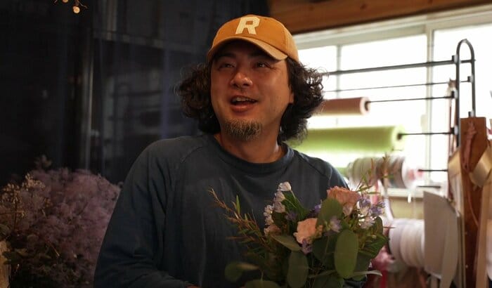 「人の温かさがこの街の良さ」と語る黒木大作さん