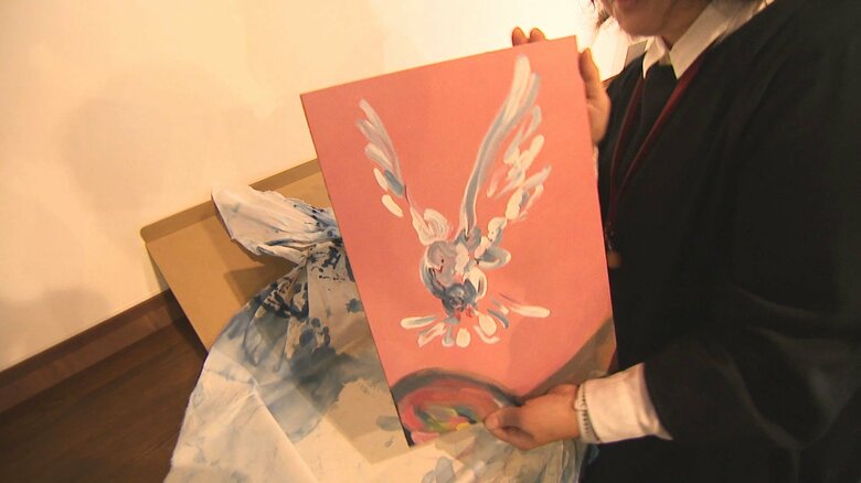 一枚は弥彦村の図書館へ