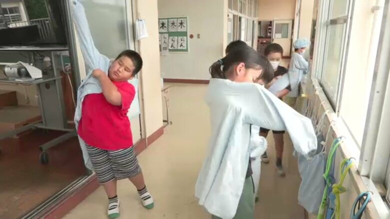 白衣に着替えて準備スタート！