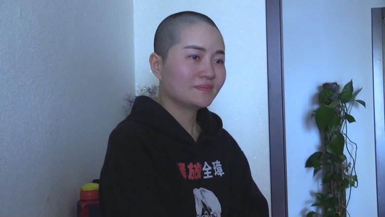 頭を丸刈りにして当局に抗議、王さんの妻・李文足さん(2019年1月)