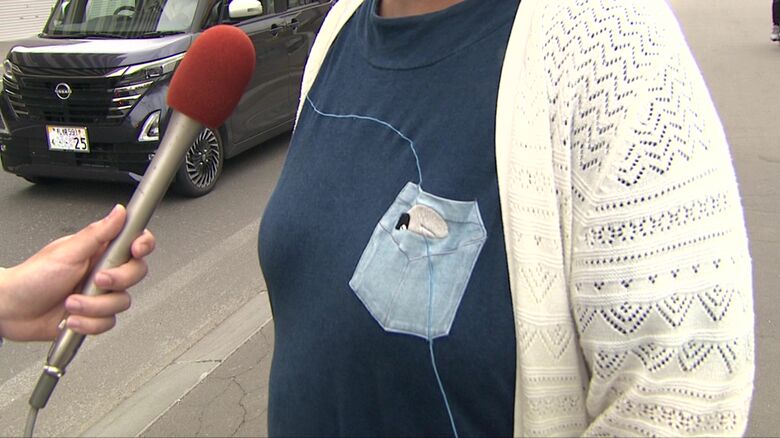 不審者に警戒する保護者