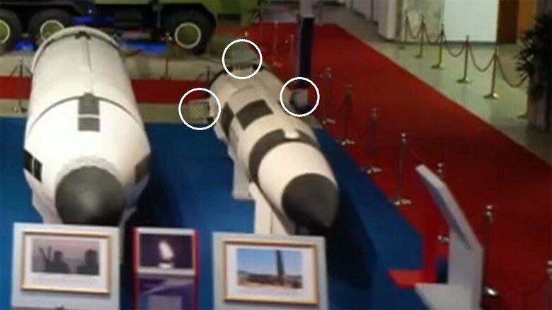 「新型潜水艦発射弾道ミサイル」白丸で囲った部分がグリッドフィン(朝鮮中央テレビ･2021年10月11日)(白丸は筆者による追記)
