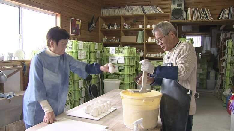 妻の光子さんと行男さん