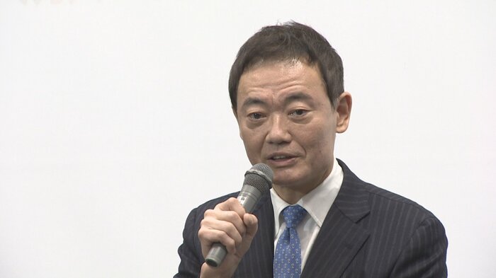 富山市内で講演する中田氏（先月21日）