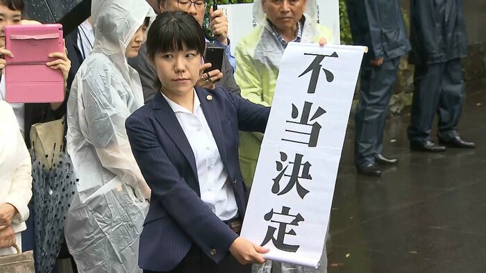 東京高裁の決定内容を伝える弁護団(2018年)