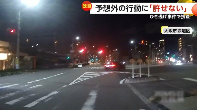 バイクに追突した黒い車が信号を無視して逃走する瞬間（1月22日午後9時ごろ、大阪市浪速区）（5）