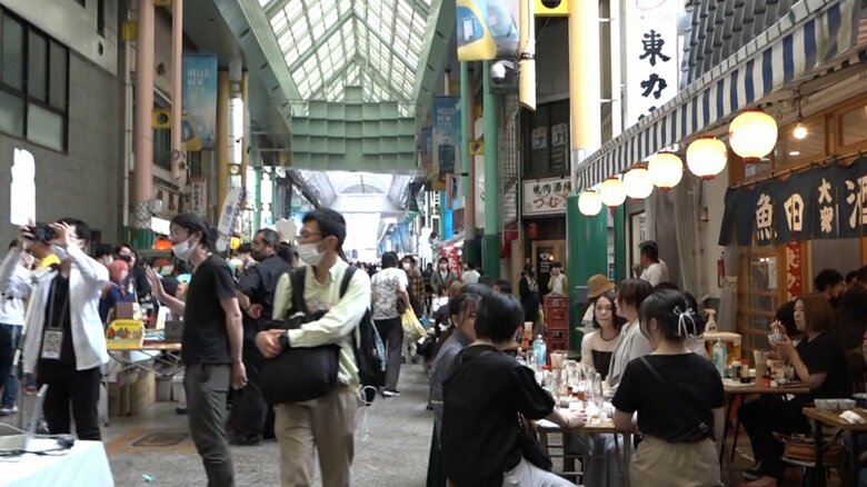 人でにぎわう「オリオン通り商店街」