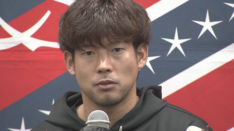 現役引退会見で思いを吐露する深井一希