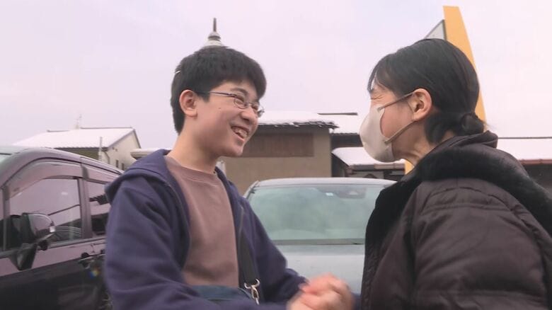 中学3年・小住優太さんと母